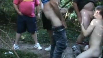 Wild men in outdoor group fuck