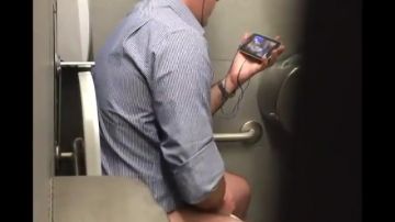 Naughty man masturbates in office bathroom
