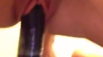 British teen rides her thick dildo